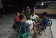 Babinsa Koramil 405-03 Kikim Bersama Perangkat Desa Sambangi Petugas di Satkamling