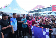 Ribuan Warga Jalan Sehat PalTV di Sukarami, Doorprize Umrah dari Holiday Angkasa Wisata