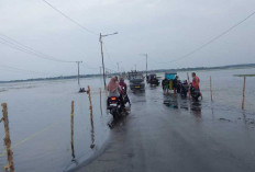 Dinas PU PR Pasang Patok di Jalan Menuju KPT Tanjung Senai yang terendam Banjir, Ini Tujuannya