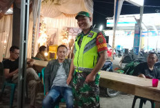 Sambangi Keramaian, Babinsa Koramil 405-06 Muara Pinang Tekankan Jaga Kondusifitas Lingkungan 
