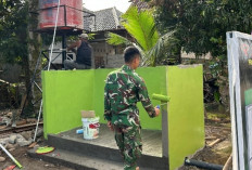 Satgas TMMD Kodim Lahaat Lakukan Pengecatan pada Sasaran Fisik TMMD Kodim Lahat Ini