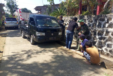 Aksi Cepat Satgas TMMD dan Warga Semarang Evakuasi Mobil Terperosok di Parit Cukil: Solidaritas Tanpa Sekat!