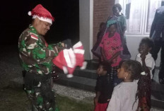 Satgas Yonif 200/BN Sambut Natal Dengan Mengunjugi Kampung Polimo