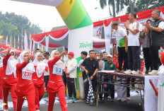 Peringati HUT ke-81 RI, Ribuan Pendidik PGRI Kota Palembang Gelar Gerak Jalan Semarak