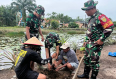 Hijaukan Bantaran Sungai PU, Satgas TMMD ke-127 Tanam Bibit Matoa di Desa Wonosari