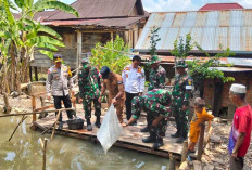 Wadansatgas TMMD Ke-122 Kodim Lahat didampingi Pj Bupati Empat Lawang Lepas Benih Ikan Nila, Dimana?