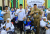 Wagub Sumsel Cik Ujang Sambut Kepulangan 443 Jemaah Haji Kloter Pertama Embarkasi Palembang