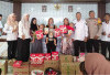 Cegah Stunting, Pemdes Rambang Senuling Bagikan Susu dan Minuman Sari Kacang Hijau untuk Balita dan Ibu Hamil